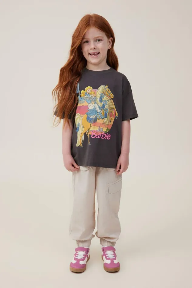 Girls Tops and TShirts Cotton On License Drop Shoulder Short Sleeve Tee Lcn Mat Barbie Westernphantom Wash Girls Tops and TShirts Cotton On License Drop Shoulder Short Sleeve Tee Lcn Mat Barbie Westernphantom Wash